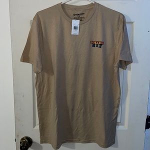 Tan with Volcom Stone on it